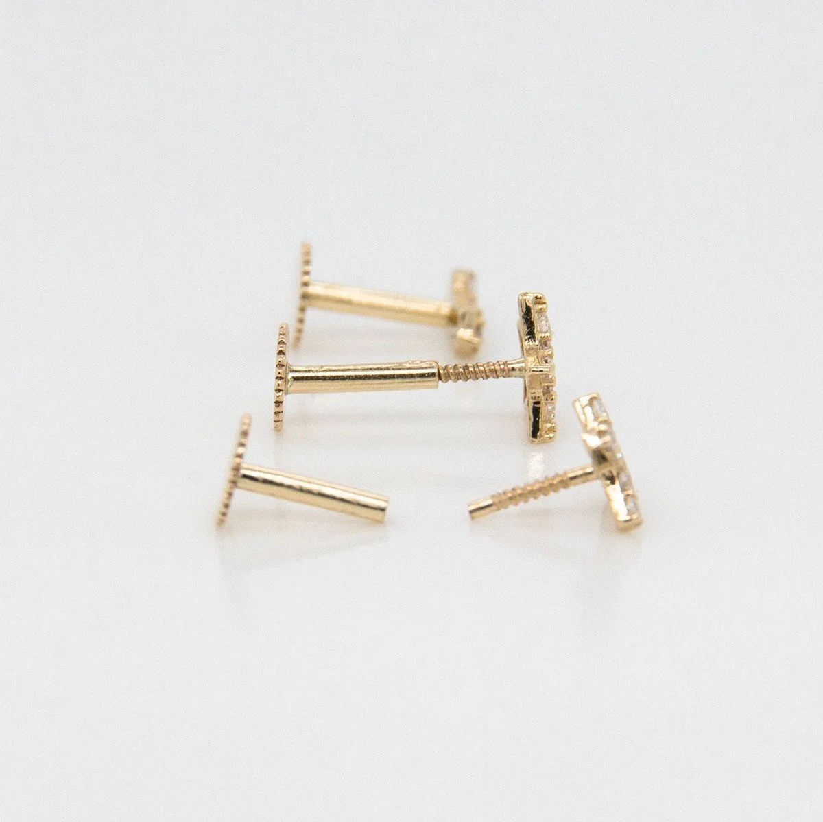 9ct Gold Cubic Zirconia Rubover Cluster Piercing