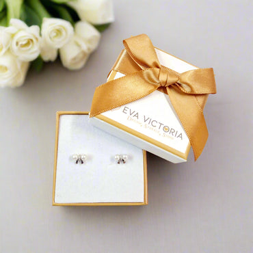 Sterling Silver CZ and White Pearl Bow Stud Earrings