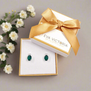 Sterling Silver CZ Topped 10mm Emerald Oval Stud Earrings