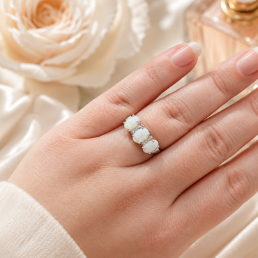 Sterling Silver Ring with 3 White Opals