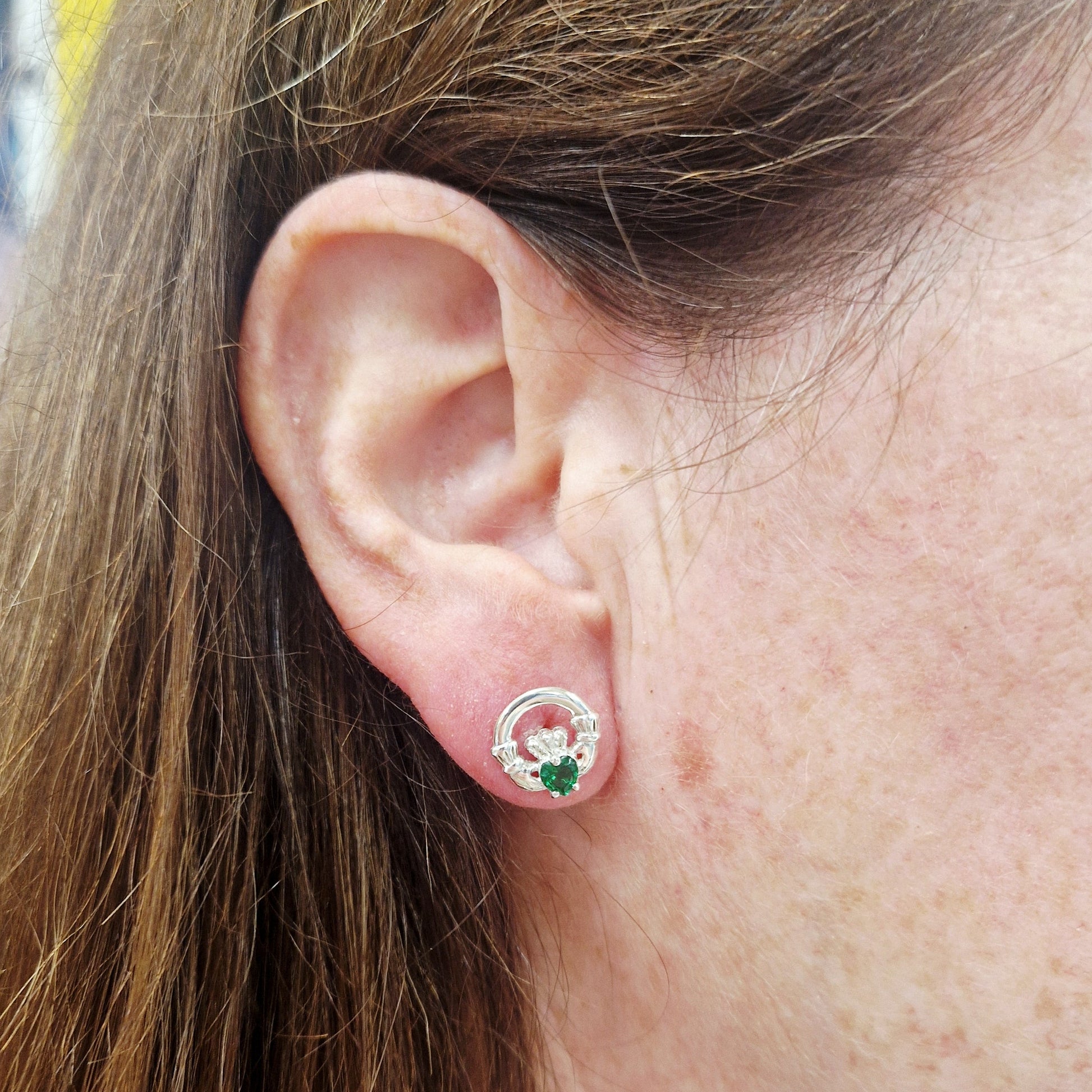 12mm claddagh stud earrings on model