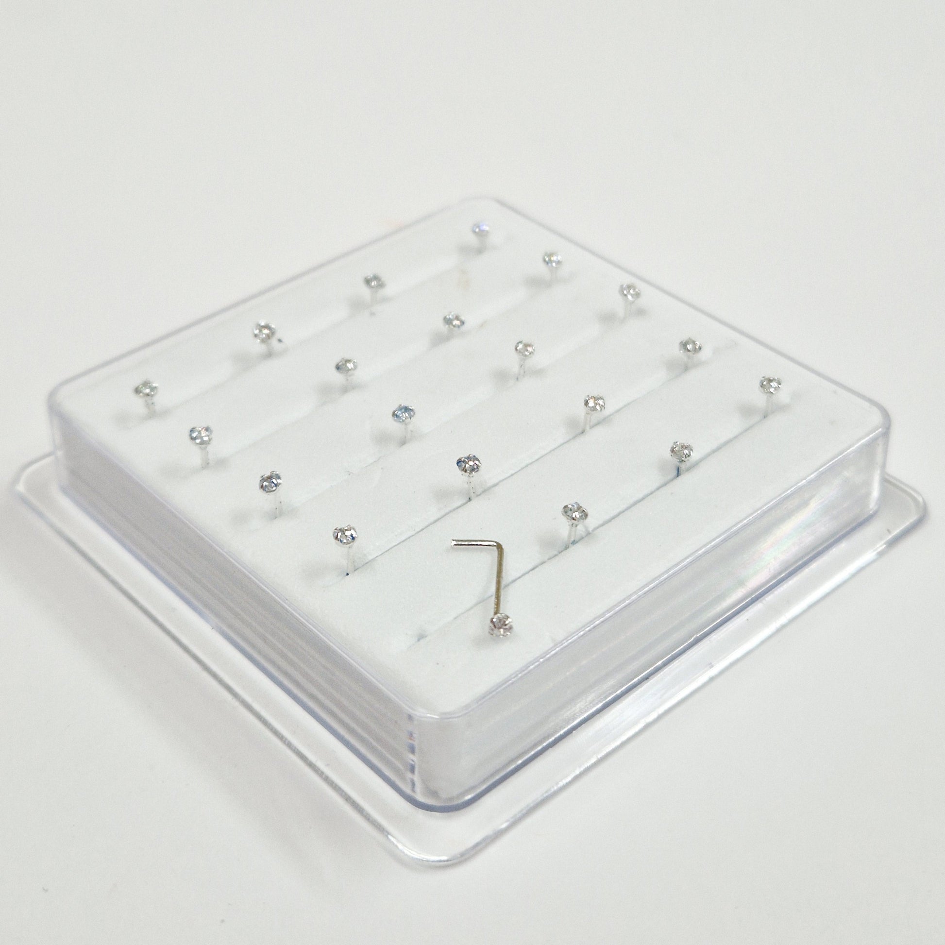 close up of l shape silver nose stud in ireland