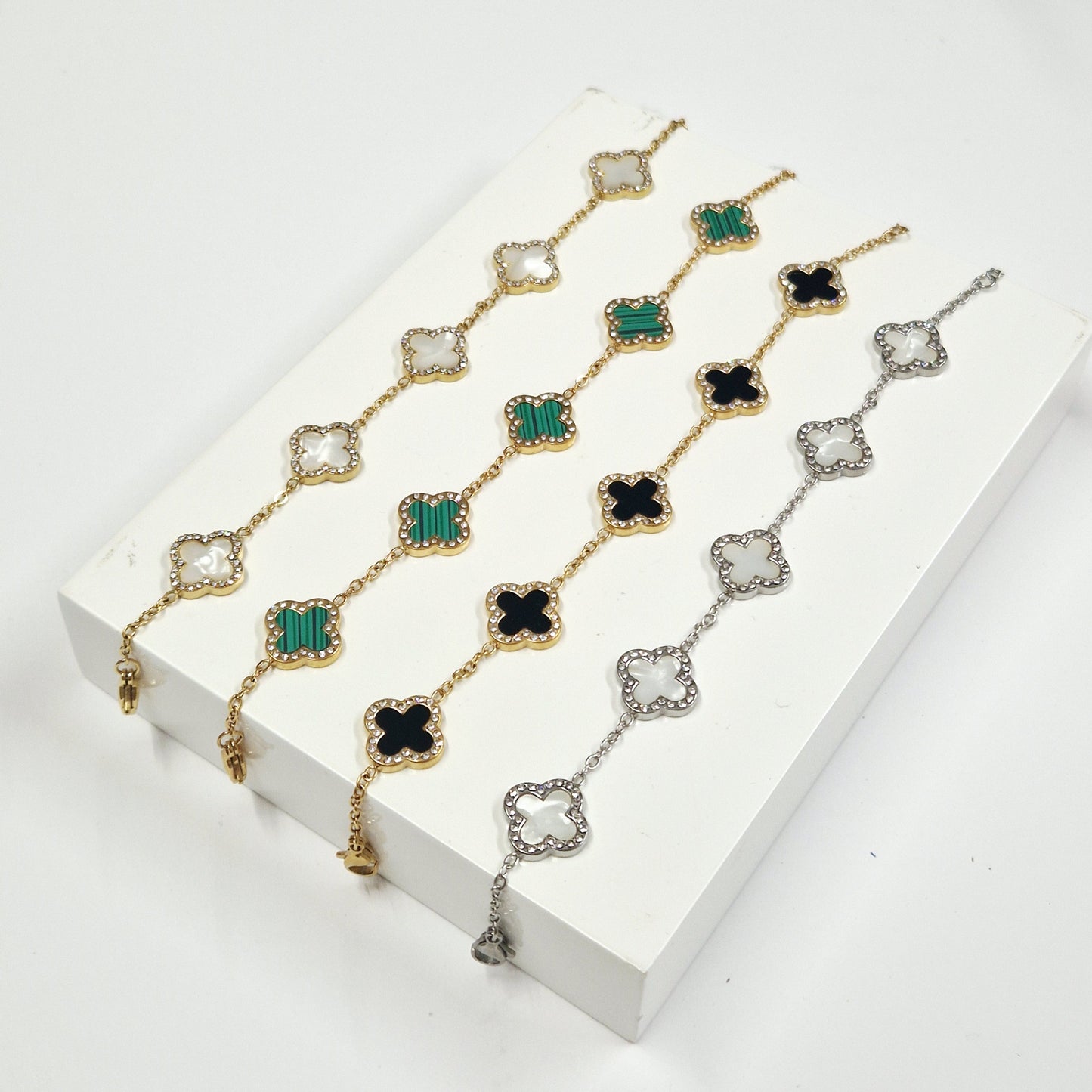 clover shape bracelets in gold and silver at eva victoria ireland