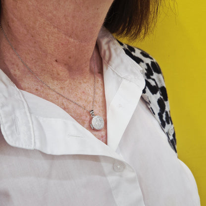 sparkling sterling silver locket on model - eva victoria ireland