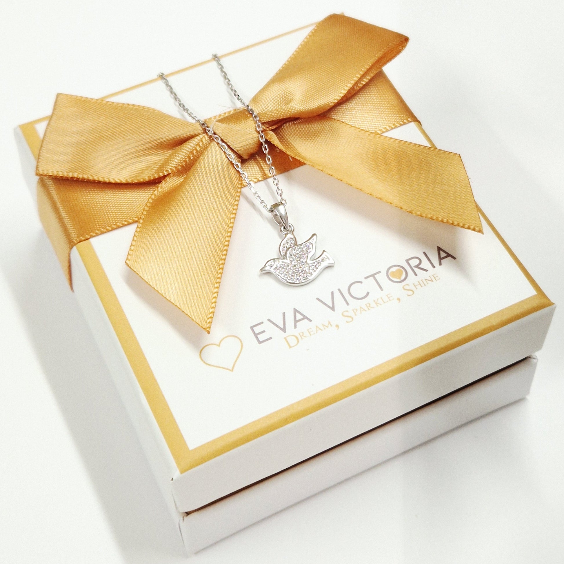 silver confirmation necklace with dove symbol