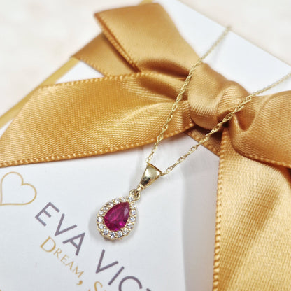 9ct gold teardrop prendant with ruby & cz eva victoria ireland