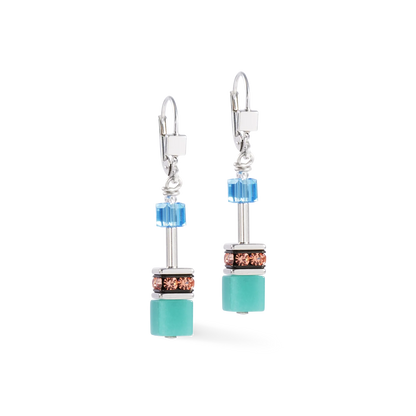 Pair of earrings with turquoise and blue beads on a white background