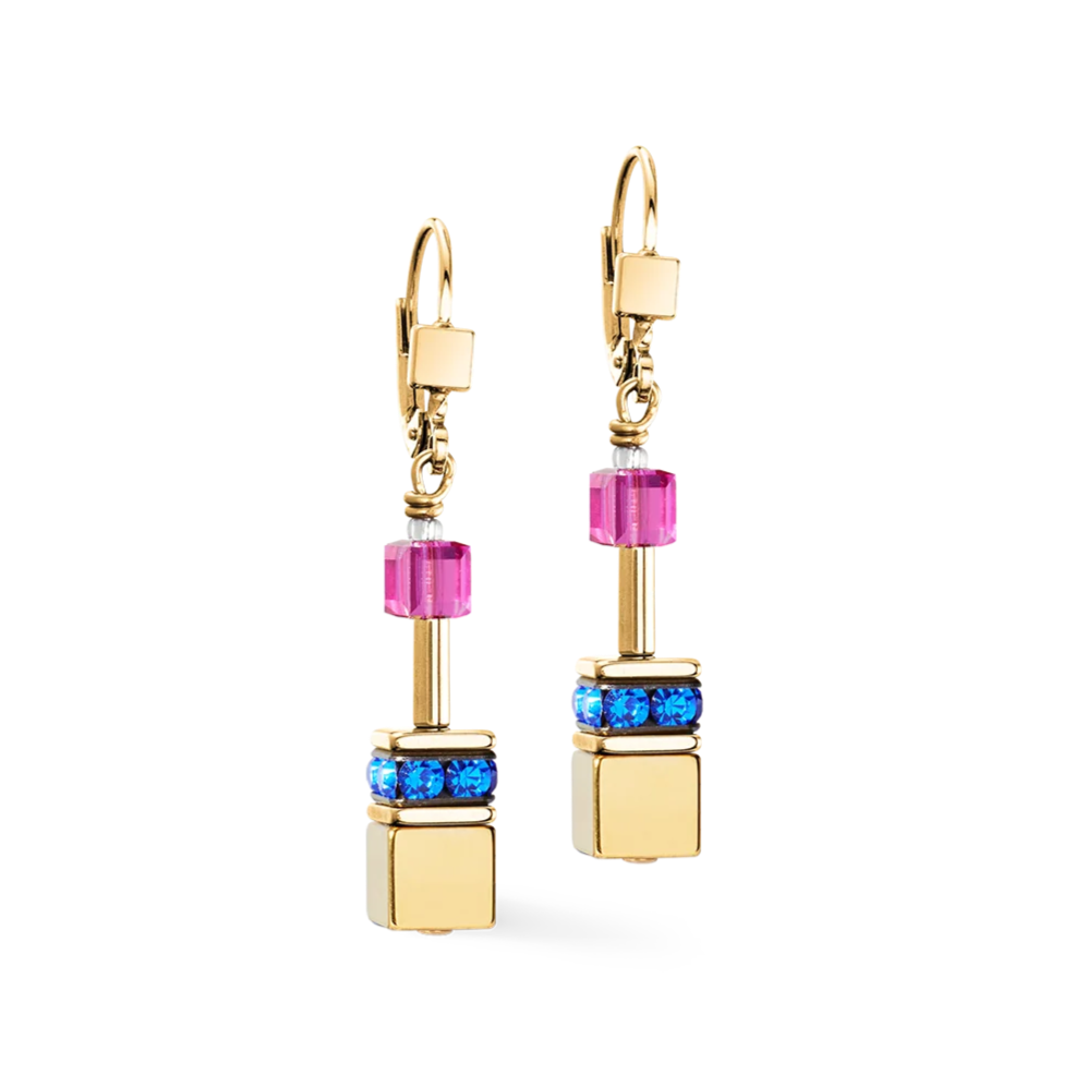Gold earrings with colorful beads on a white background