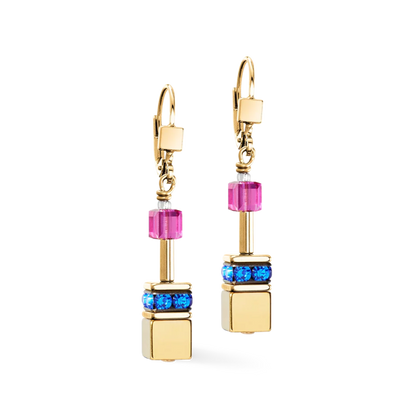 Gold earrings with colorful beads on a white background