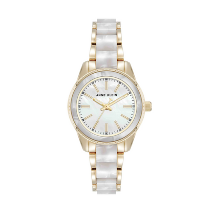 Anne Klein watch with gold and white strap on a white background