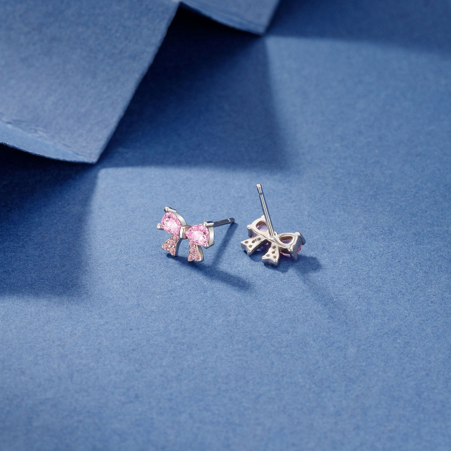 Gift-ready sterling silver pink bow stud earrings from Eva Victoria