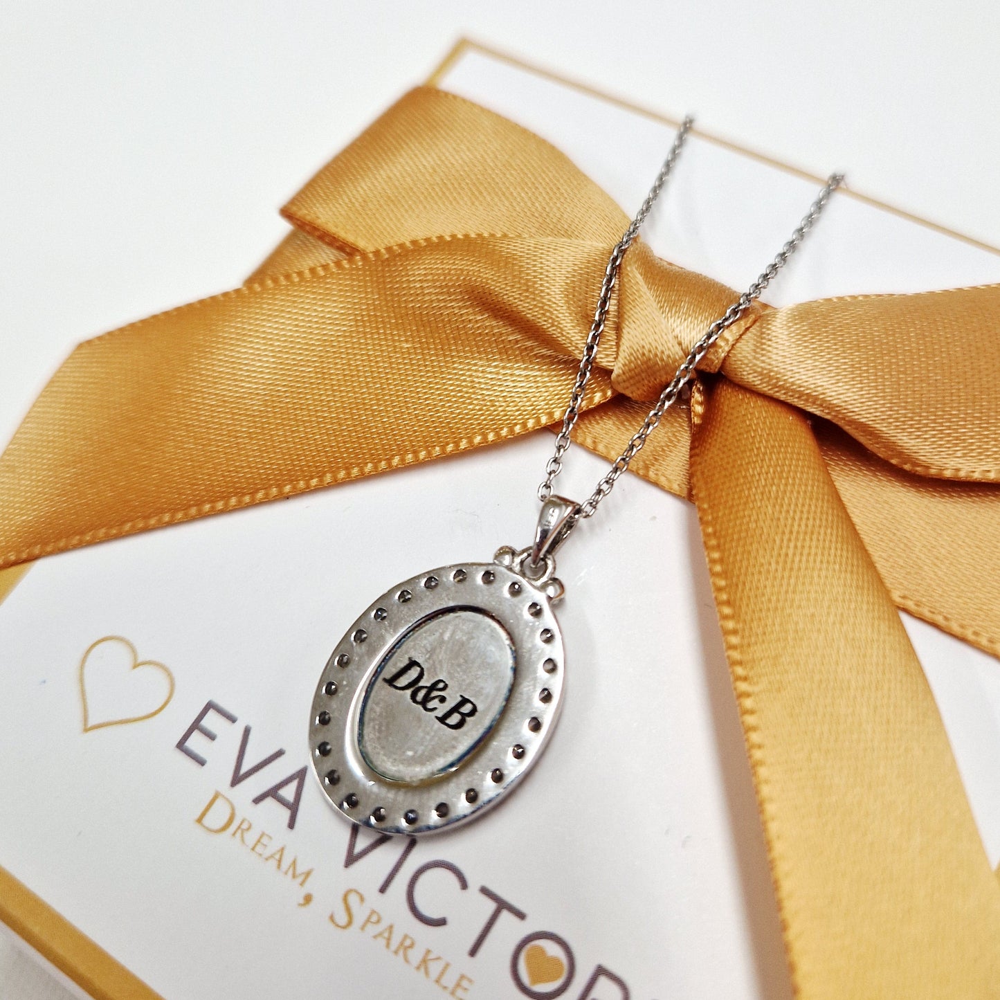 Engraving on Miraculous Medal 