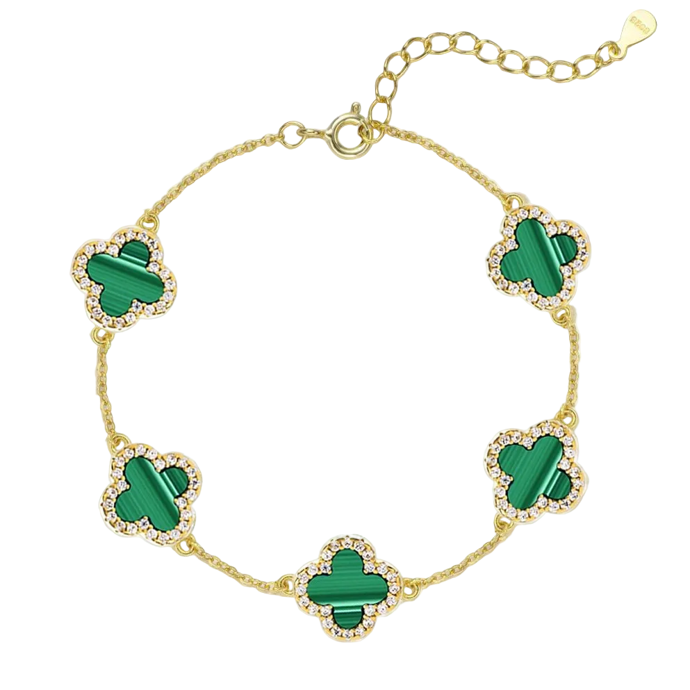Gold bracelet with green clover-shaped charms in ireland