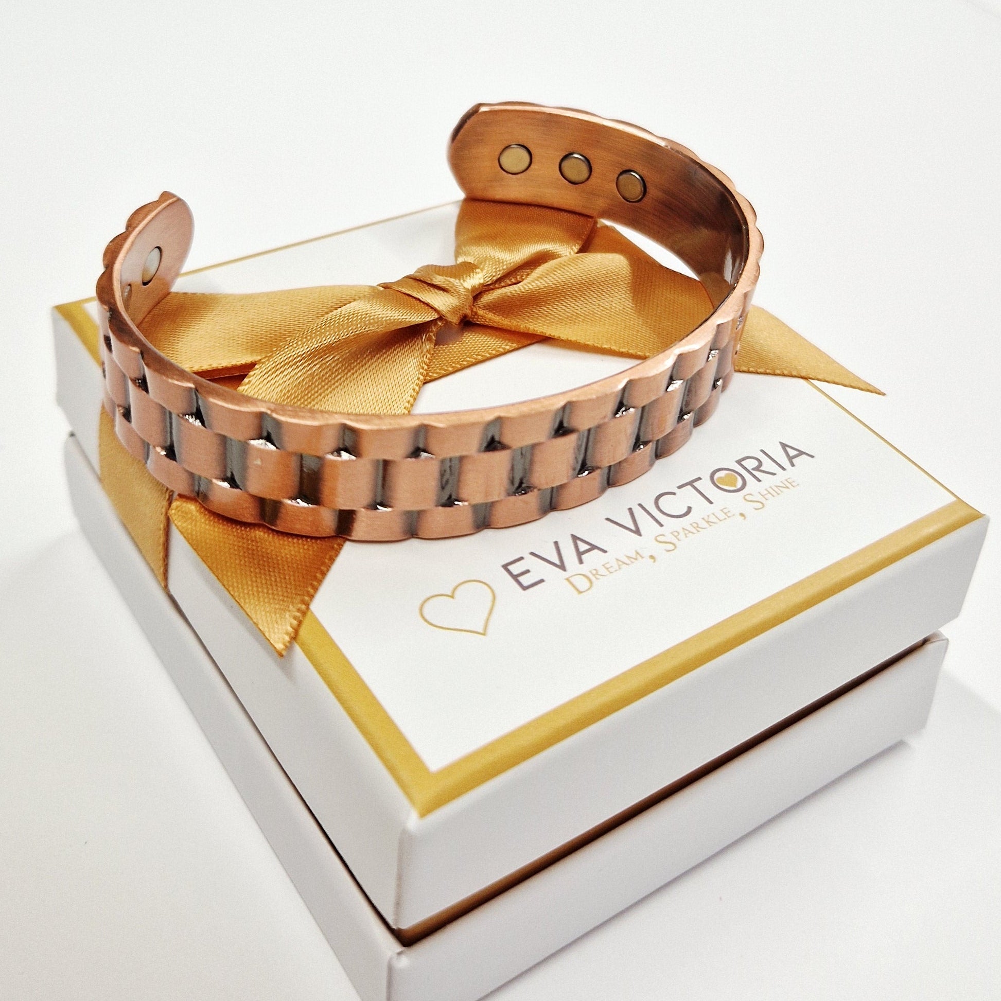 Eva Victoria copper bangle with six embedded magnets