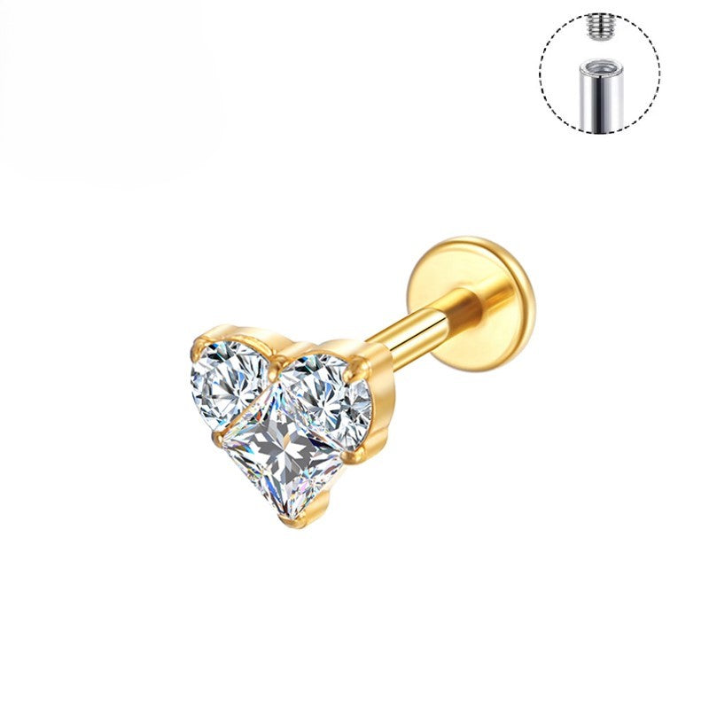 Gold heart-shaped crystal earring on a white background