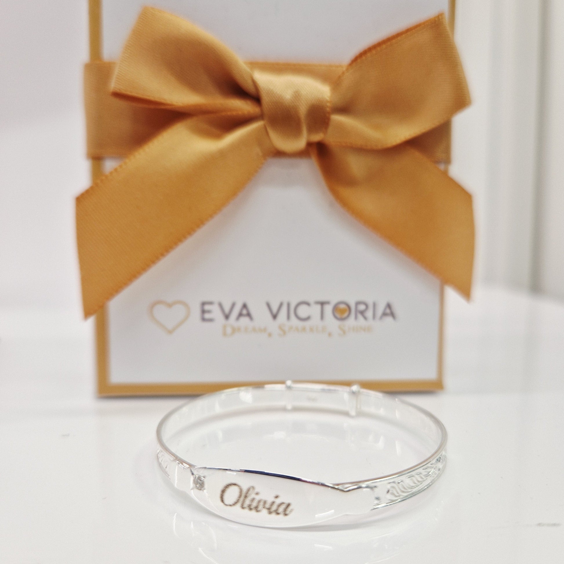 Engravable sterling silver christening baby bangle with sparkling clear cubic zirconia