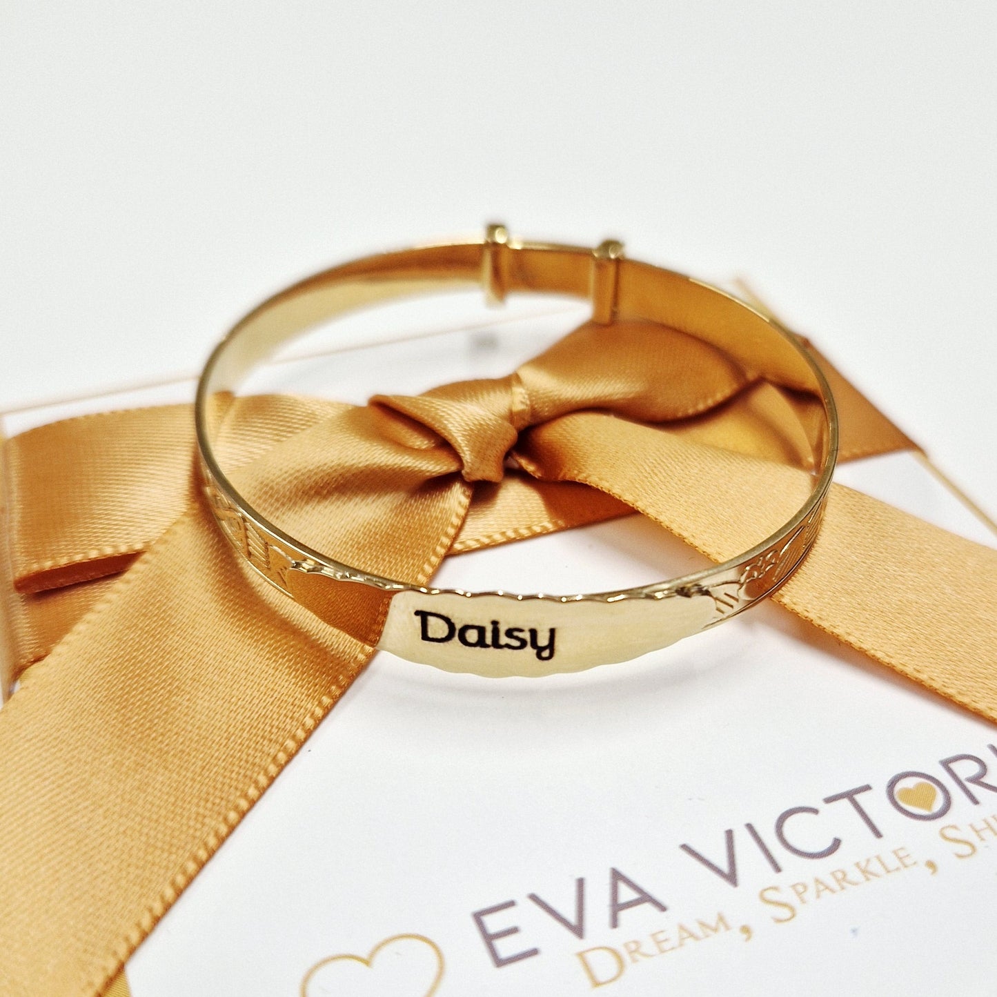 gold claddagh baby bangle with engraving in ireland