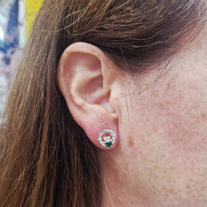 green claddagh stud earring on model