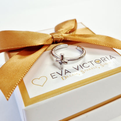 adjustable size silver ring for kids with 'Eva Victoria' branding on a white box with a gold ribbon.