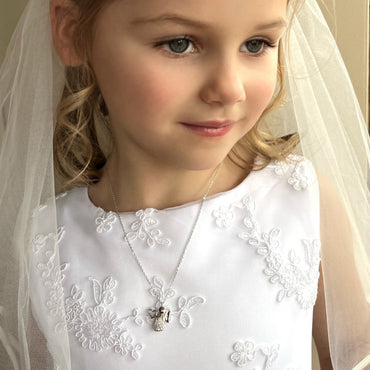 Angel holding Heart Sterling Silver Pendant