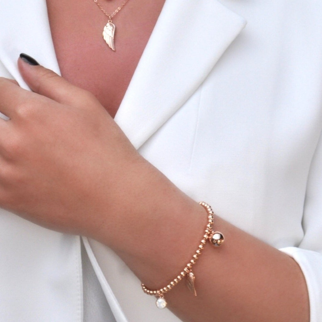Shop Angel Wing Charms Rose Gold Beaded Bracelet